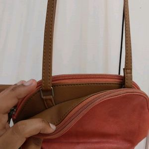 Baggit Leather sling Bag Coral Color With 2 Compar