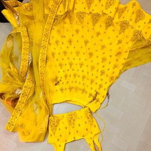 Yellow Net Lehnga For Haldi Ready