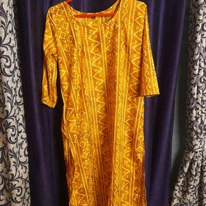 Beautiful yellow badhni print polyester kurti....N