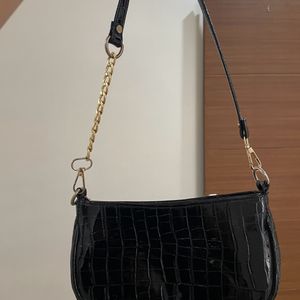 Black Leather Bag With Golden Details