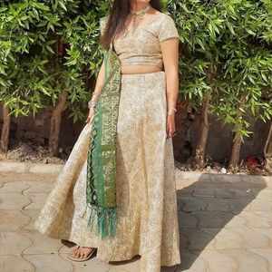 Cream Colour Lehenga Choli With Green Dupatta