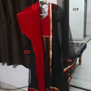 Red & Black Net And Shehneel Frock Suit