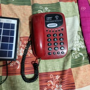 Solar Plate With Telephone As Freebies