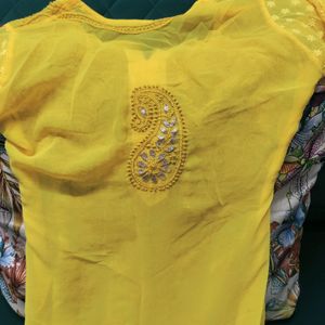 Yellow Chikankari Kurta And White Flared Palazzo