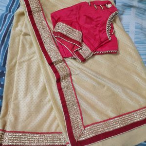 pretty red golden saree.