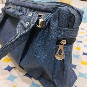 Blue Handbag With Multiple Pockets