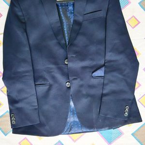 A navy blue Coat