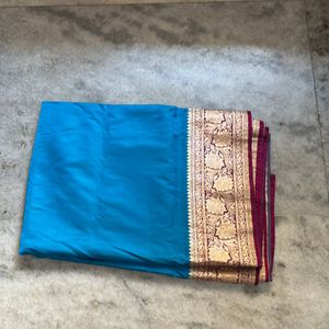 Beautiful Blue Banarasi Saree With Pink Border