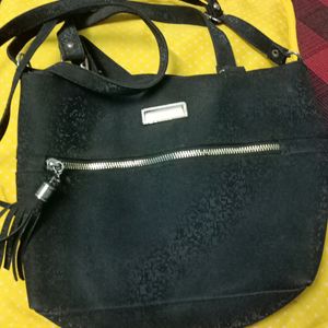 Black Sling Bag With Handle And Long Strip