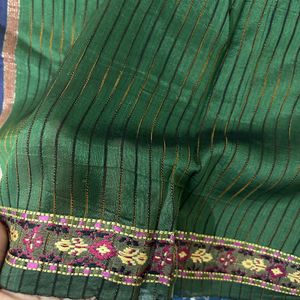 a butiful saree with sober design