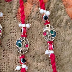 RAKHI with Morpankh, Red Evil Eye & Pearls