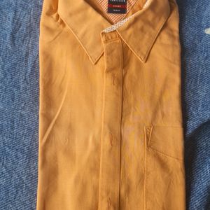 A Beautiful Orange Van Heusen Shirt