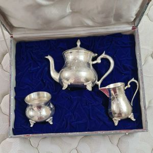 Antique Tea Set with silver polish