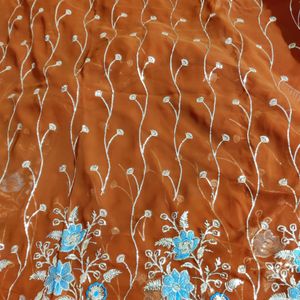 Beautiful Design Light Rust Color Saree