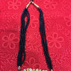 Designer Black Moti Golden Necklace