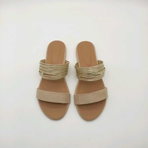 Tan And Gold Flat Sandals.