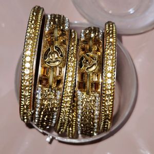 Bronze And Gold Toned Stoned Bangles Set Of 8