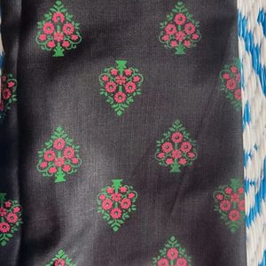 pure cotton black colour long kurta which has red and green printed flowers ..the kurta is unused