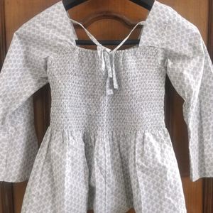 Smocked White Top with Grey Print