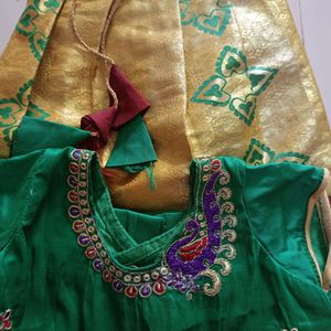 Pattu Pavadai Green And Gold Color Mixed