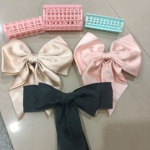 combo of 3 bows and hair rollers