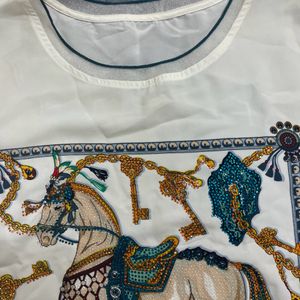 trendy horse print top