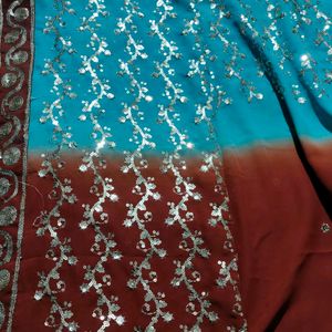 Sky And Brown Georgette Saree With Sequence.