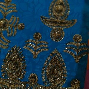 Peacock Blue Georgette Saree With Stitched Blouse