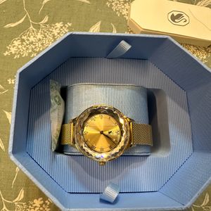 Swarovski Stainless Steel Analog Gold Tone Dial Wo