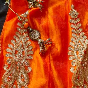 Selling Lehnga With Orange And Golden Colour