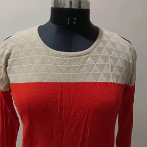 coral and cream colour top in very good condition