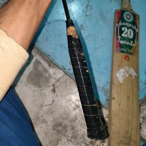 combo cricket bat and badminton racket old