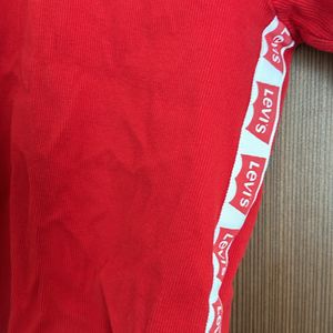 Red Top With Levis Strip At The Sides Turtle Neck