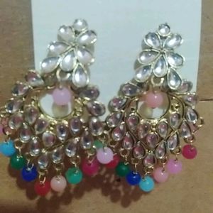 Beautiful ear rings multi colored with stones and gold polish