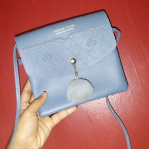 A Light Pretty Blue Sling Bag!