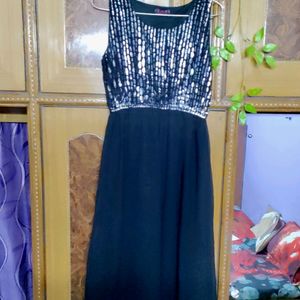 Black slip dress, ankle length. Regular fit party wear dress