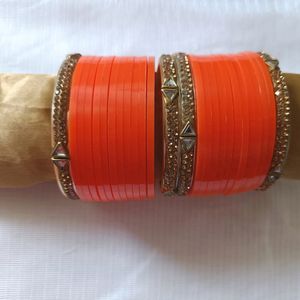 Orange Plastic Bangles Set.