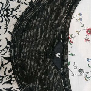 A Black and White Tunic From FIG