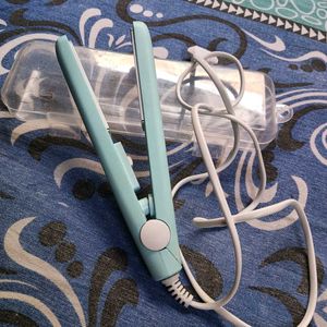 A New MINI HAIR STRAIGHTENER FOR SALE