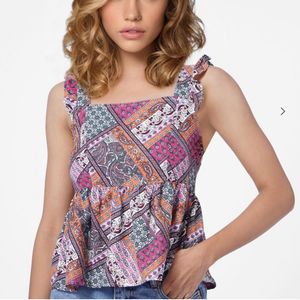 peplum sleeveless top