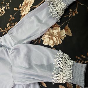 Price Drop!! Light Blue  Flowered Top!!