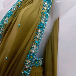 Olive Green Saree With Blue Zari Work On