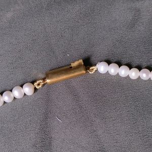 Channel Pearl Necklaces