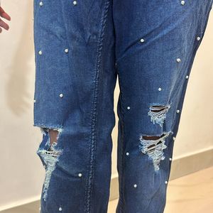 Dark blue mom fit jeans with Moti design