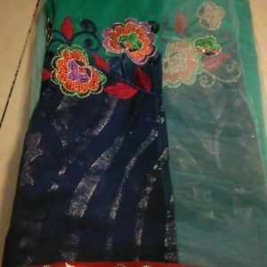 Half-georgette, Half-net. Festive Saree