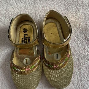 Golden Shoes For Tiny Feet