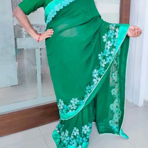 Bottle Green Floral Bordered Saree