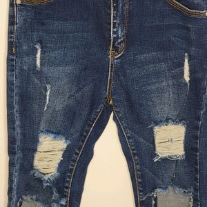 DOLCE & GABBANA- EXTREME DISTRESSED DENIM BLUE JEANS FOR WOMEN