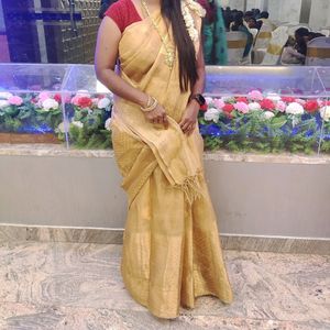 Gold tissue silk saree trending with stiched blous