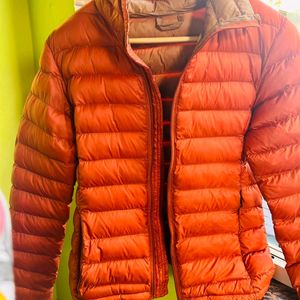 Orange puffer packable jacket